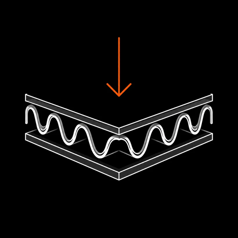 Corrugated board cross-section under a compression load